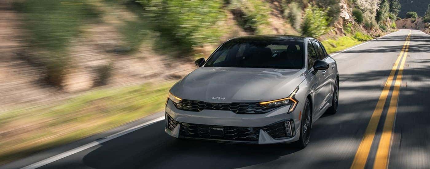 Grey 2025 Kia K5 GT for sale in Knoxville on a test drive.