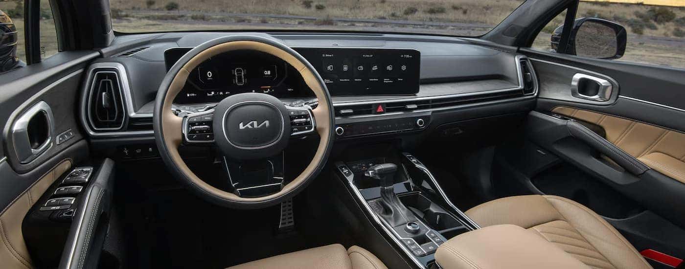 Black and tan interior and dashboard of a 2025 Kia Sorento for sale in Knoxville