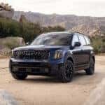 Black 2025 Kia Telluride for sale near Oak Ridge driving off-road.