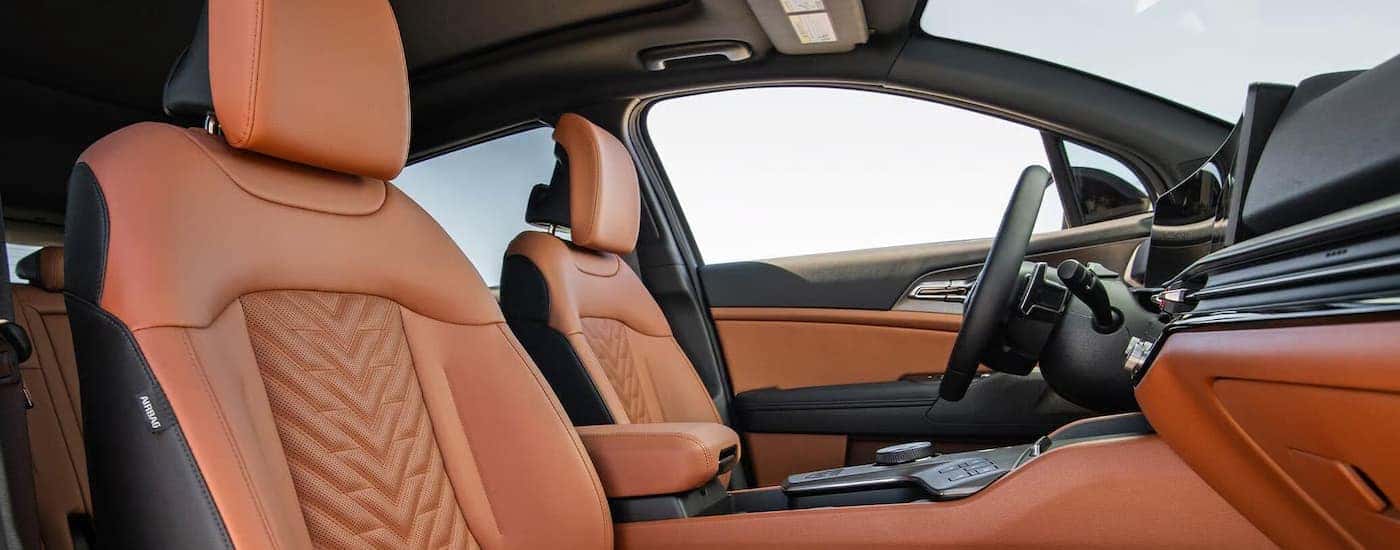 Black and brown leather seats inside a 2026 Kia Sportage for sale near Farragut