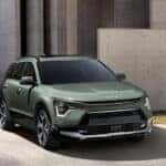 Front view at an angle of a green 2025 Kia Niro for sale.
