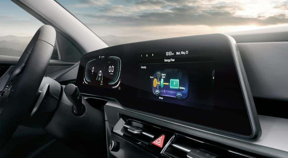 Infotainment system and digital gauge cluster on the 2025 Kia Niro Plug-In Hybrid.