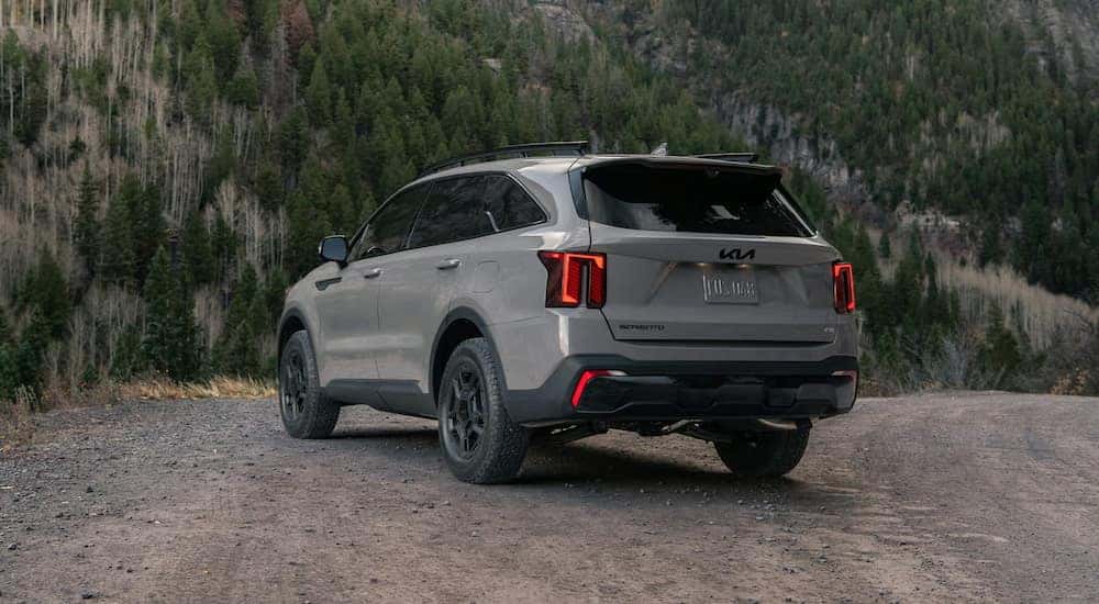 Rear view from an angle of a green 2026 Kia Sorento for sale near Jacksboro.