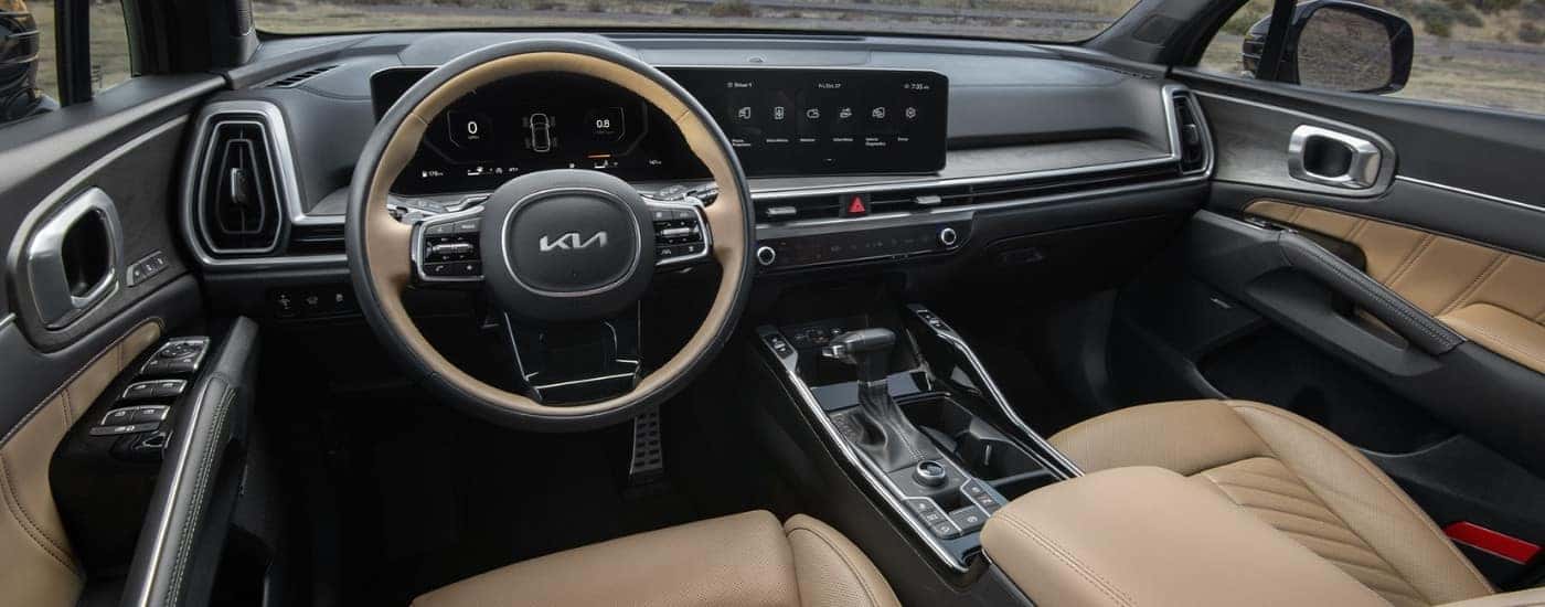 The tan interior of a 2025 Kia Sorento.