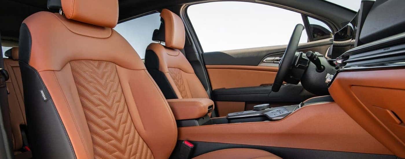 The brown interior of a 2026 Kia Sportage.
