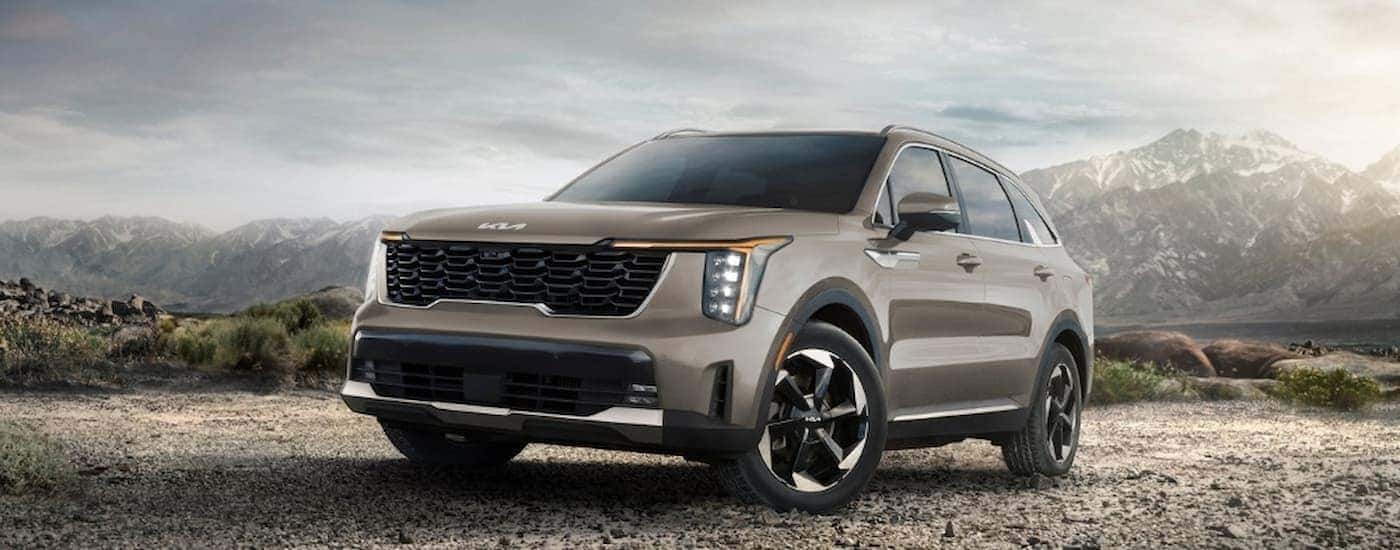 A tan 2025 Kia Sorento parked off-road