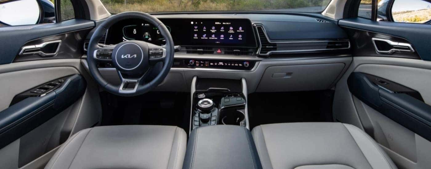 Black and grey interior in a 2025 Kia Sportage HEV
