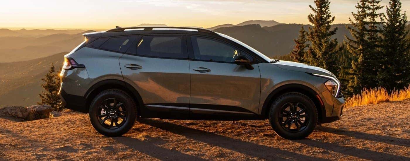 Grey 2023 Kia Sportage parked at an overlook