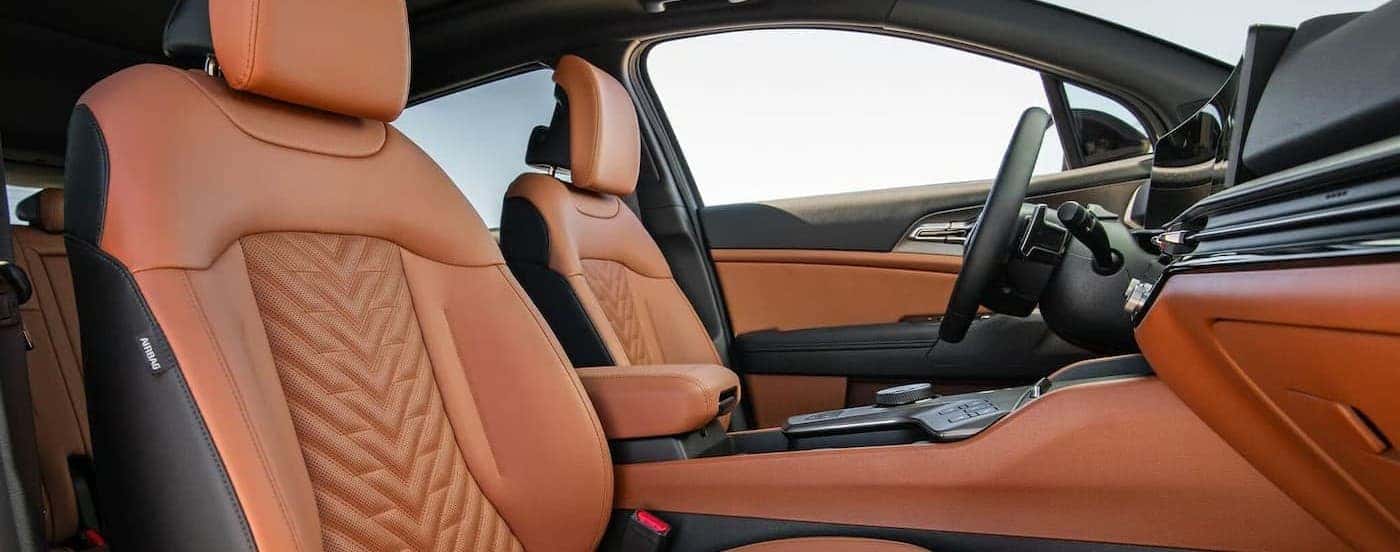 Black and brown interior in a 2026 Kia Sportage.