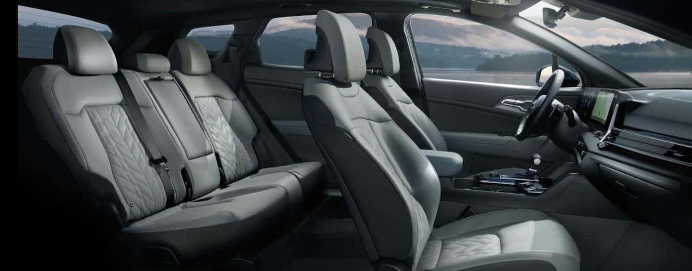 A black leather interior inside a 2024 Kia Sportage