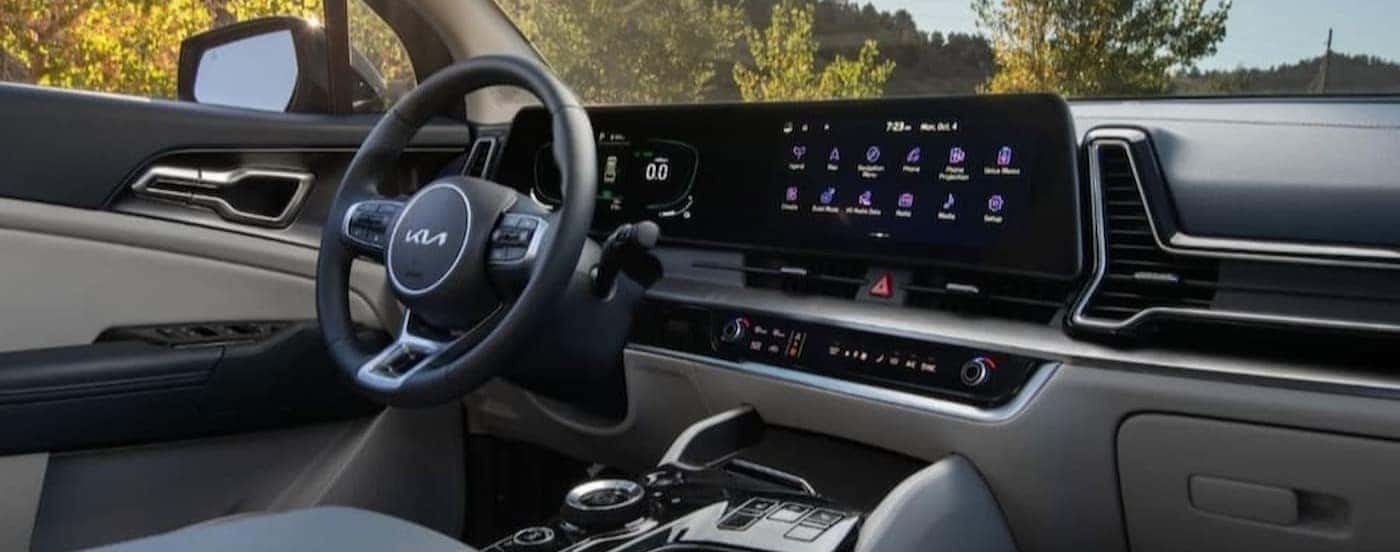 Black and gray dash in a 2023 Kia Sportage.