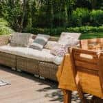 Cute sunny terrace in the green garden of trendy estate
