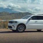 white Citadel SUV overlooking water and mountains