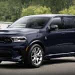 The 2025 Dodge Durango Hellcat Hammerhead Special Edition parked in front of a lush nature landscape