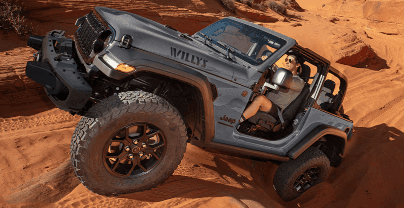 2025 Jeep Wrangler crawling on rocky terrain