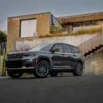 2024 Jeep Grand Cherokee L parked in front of a house