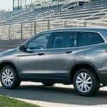 Family loading Honda Pilot