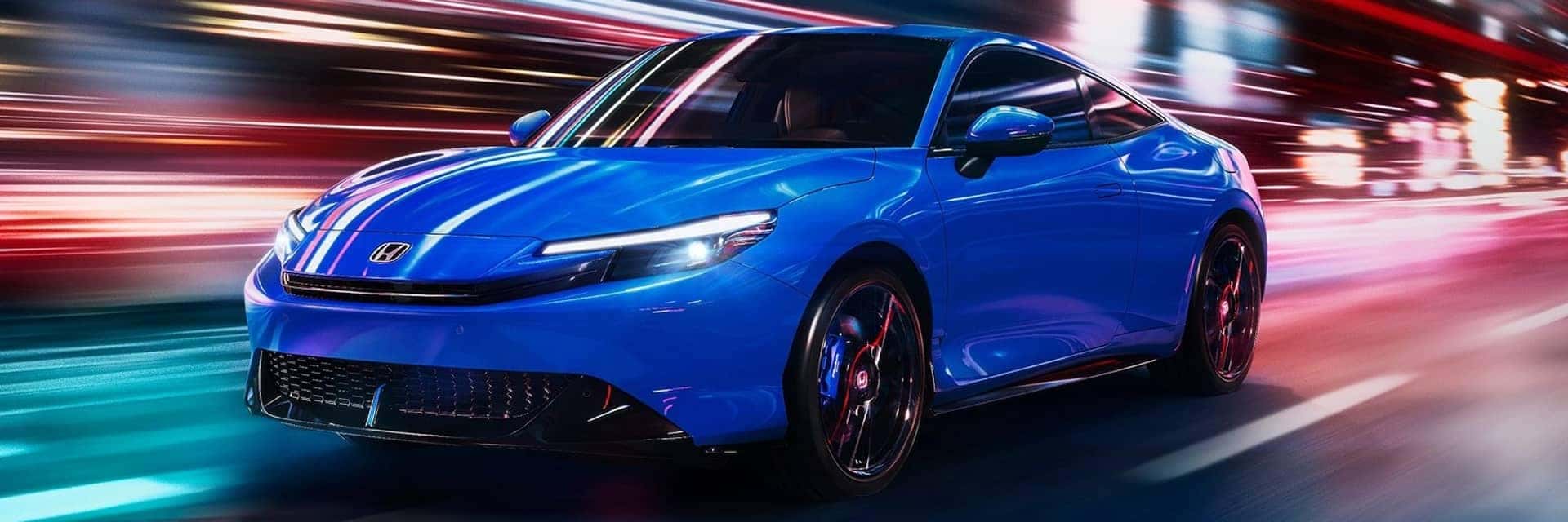 2026 blue honda prelude hybrid driving fast on road