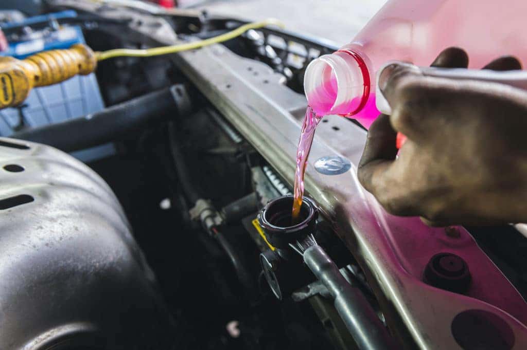 Where Is the Coolant Reservoir Located? - In The Garage with