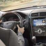Driver behind the wheel of the 2018 Ford Explorer