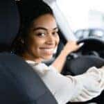 Young woman in car