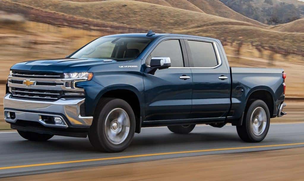 blue truck on road