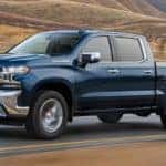 blue truck on road