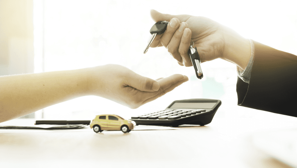 Hand Holding Car Keys