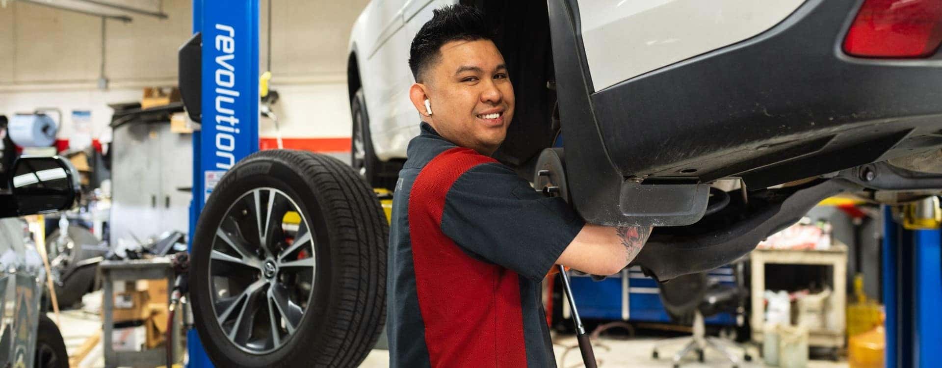 Yokem Toyota technician performing a wheel alignment